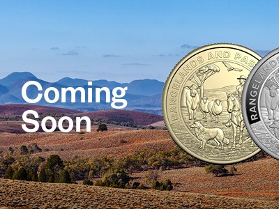 Two $1 Heart and Soul of Australia coins against an Australia landscape with text 'Coming Soon'.