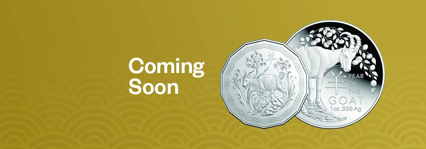 Two Year of the Goat coins against a gold background with text "Coming Soon".